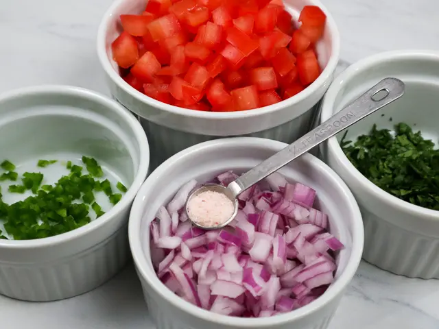 all the ingredients for pico de gallo in their own separate bowls.