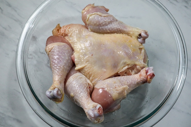 Raw bone-in chicken