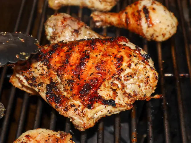 bone-in chicken on the grill almost done