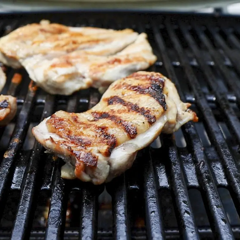 grill marks on chicken on the grill
