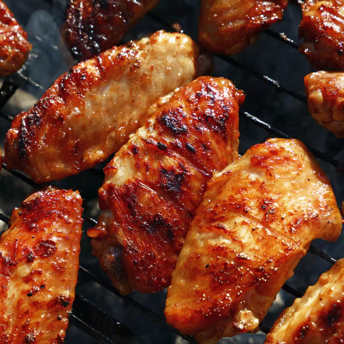 Grilled chicken wings on the grill.