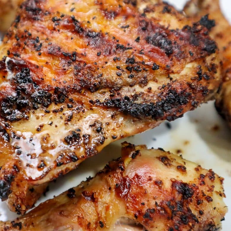 grilled bone in chicken breast on a plate